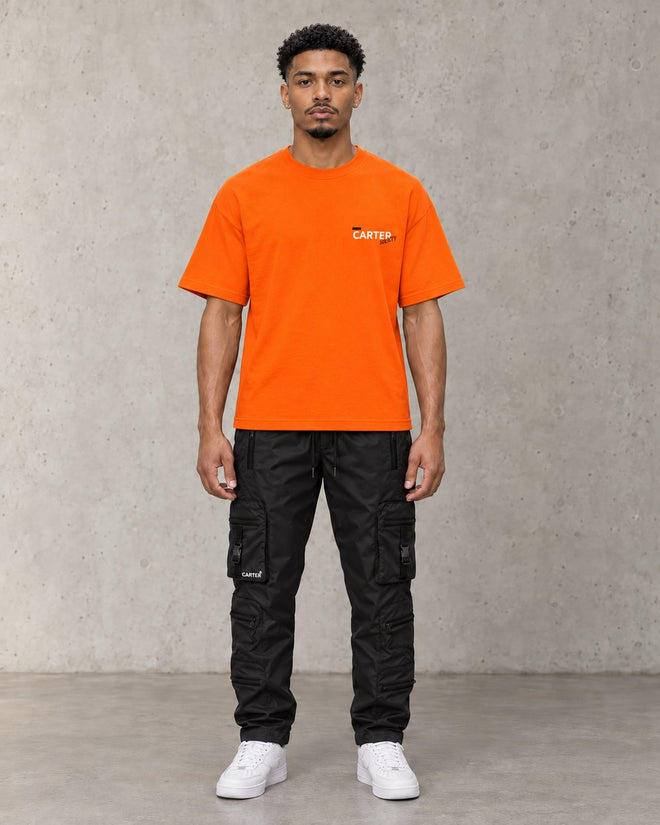 Freedom (MLK) Oversized Tee Orange, front, concrete studio