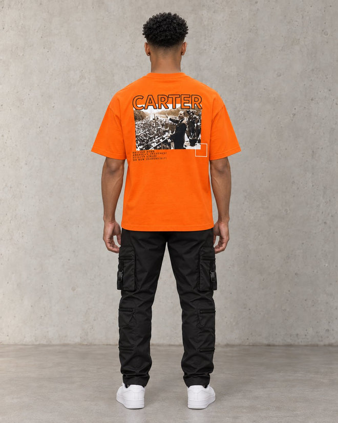 Freedom (MLK) Oversized Tee Orange, back, concrete studio