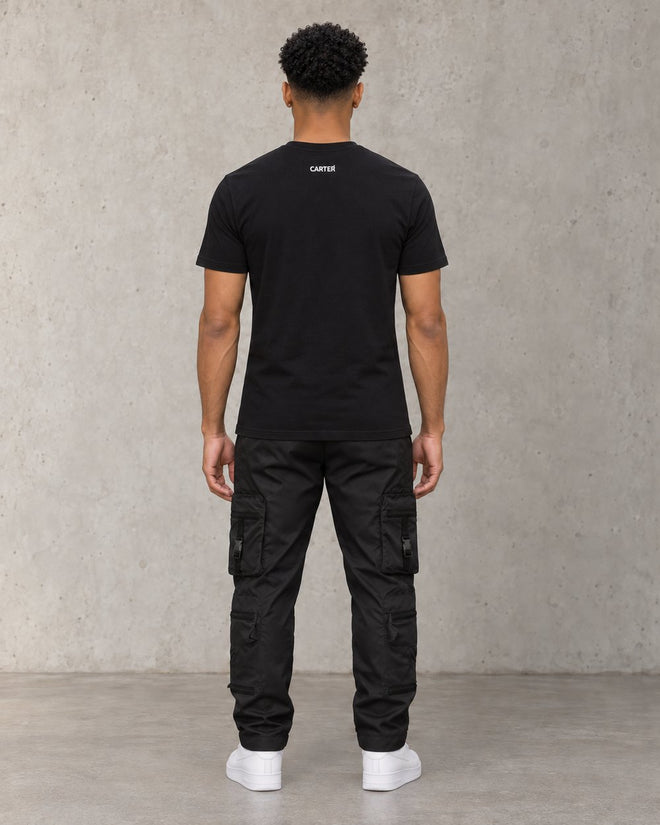 Saint Fitted Tee Black, back, concrete studio